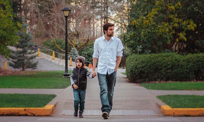 man and boy walking