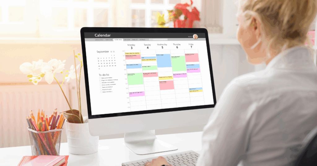Woman editing her calendar on the computer