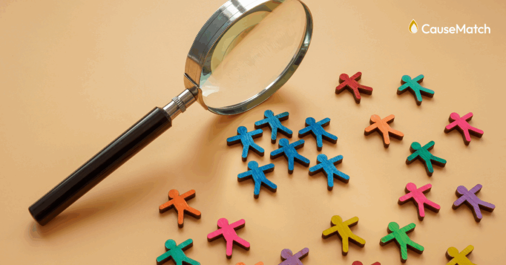 segmentation of little wooden people cut-outs under a magnifying glass.