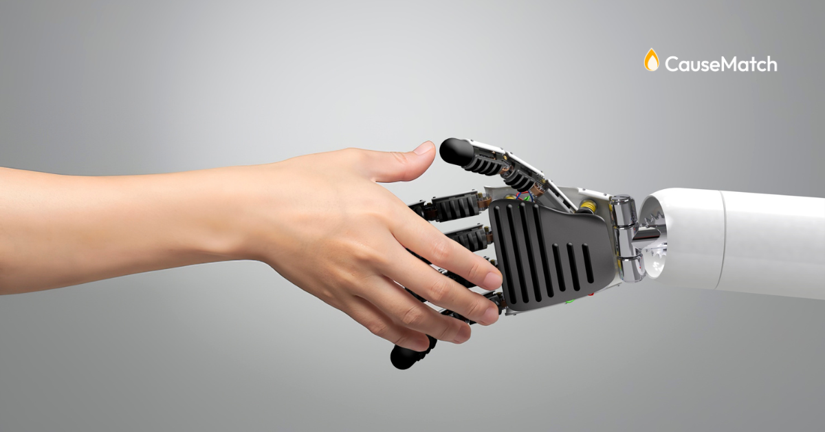 Hand of a human shaking robot hand signaling friendship and partnership
