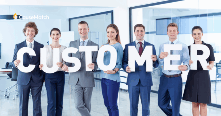 employees holding up the word "Customers:
